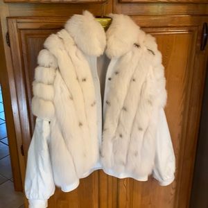 White leather and fur jacket.